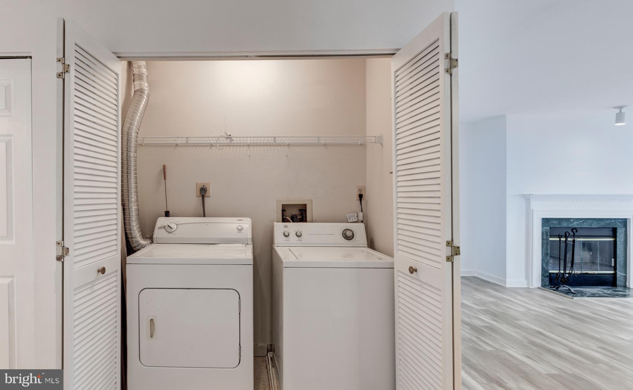 385 Pleasanton Road, Unit B22 Westminster, MD 21157 - Photo 21 of 35 a utility room with dryer and washer