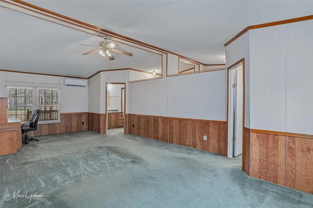 a view of an empty room with window