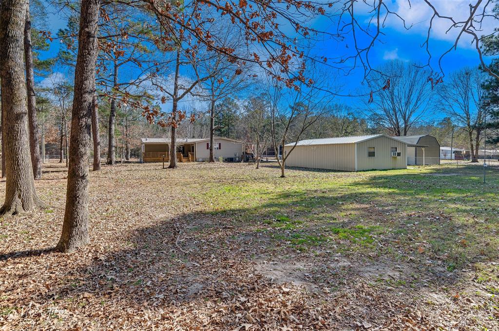 174 Bethel Road Frierson, LA 71027 - Photo 21 of 23 a view of a backyard with large trees