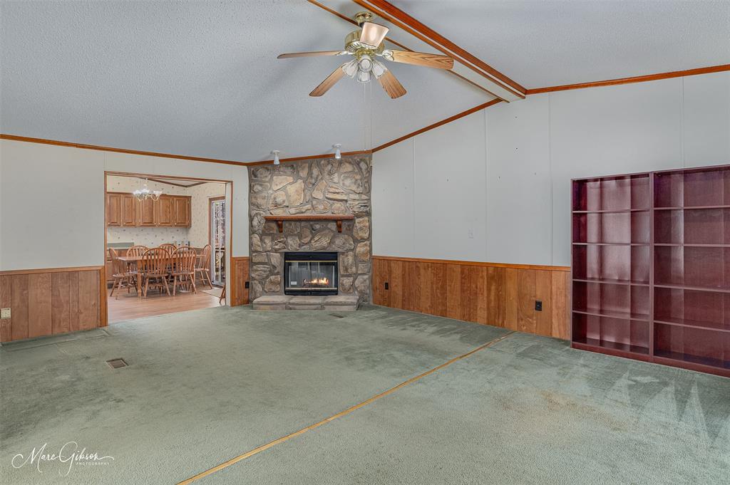 174 Bethel Road Frierson, LA 71027 - Photo 9 of 23 a view of a livingroom with furniture and staircase