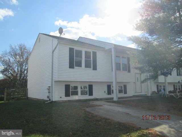 81 Haverhill Road Joppa, MD 21085 - Photo 1 of 18 a front view of a house with a garden