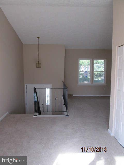 81 Haverhill Road Joppa, MD 21085 - Photo 2 of 18 a view of empty room with windows