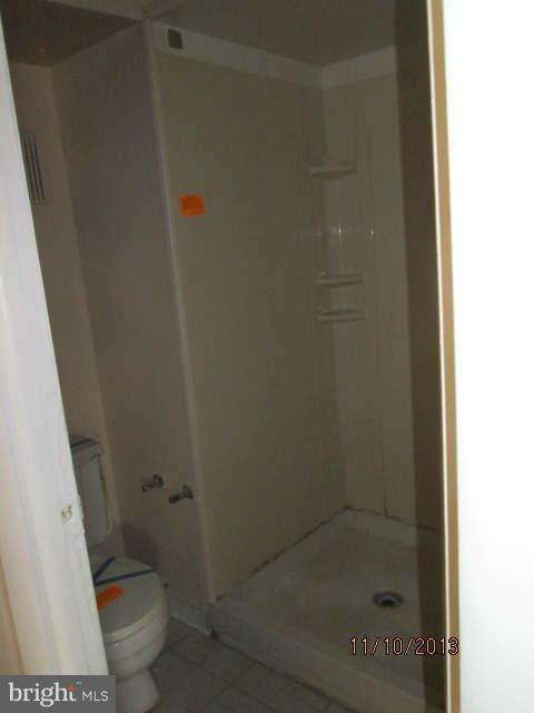 81 Haverhill Road Joppa, MD 21085 - Photo 13 of 18 a bathroom with a shower and toilet