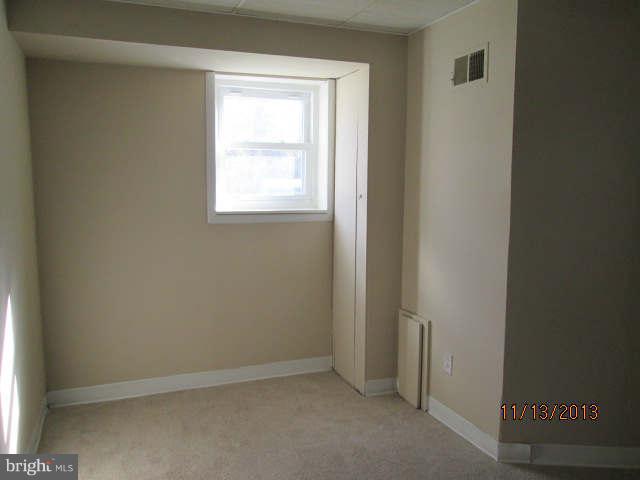 81 Haverhill Road Joppa, MD 21085 - Photo 16 of 18 an empty room with a window