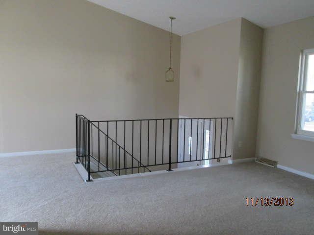 81 Haverhill Road Joppa, MD 21085 - Photo 3 of 18 a view of a hallway with a window