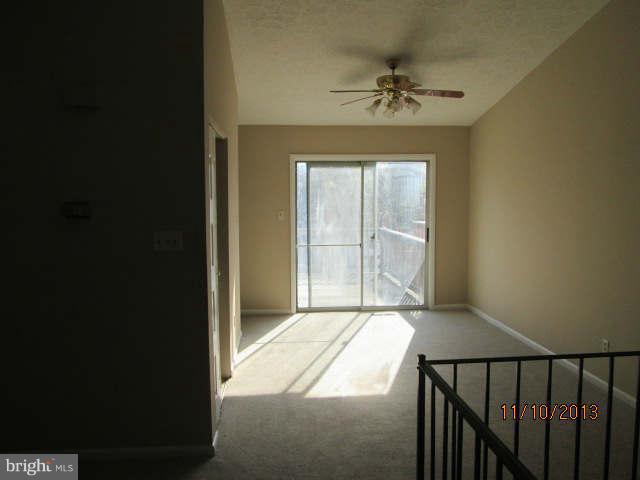81 Haverhill Road Joppa, MD 21085 - Photo 5 of 18 a view of a hallway to a window