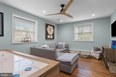 a bedroom with a large bed and a couch