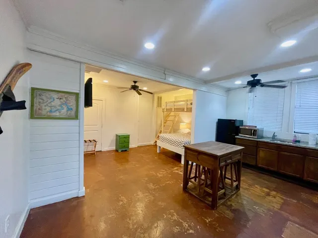 a view of a workspace with furniture