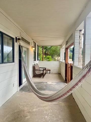 a view of a living room and natural light