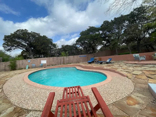 a view of outdoor space yard and swimming pool