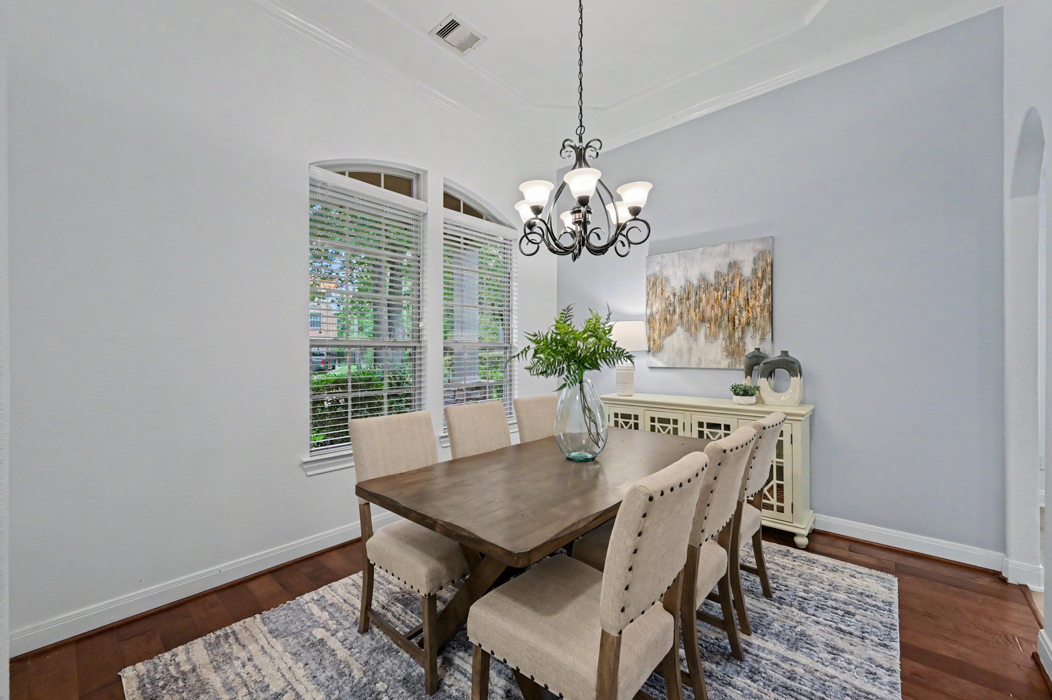7 Fraiser Fir Place Spring, TX 77389 - Photo 8 of 26 a view of a dining room with furniture and chandelier