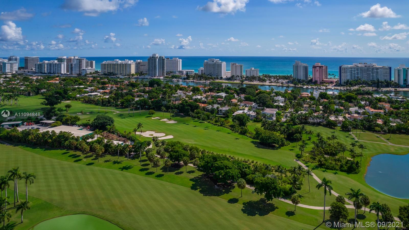 5235 North Bay Road Miami Beach, FL 33140 - Photo 22 of 22 a view of a house with a yard