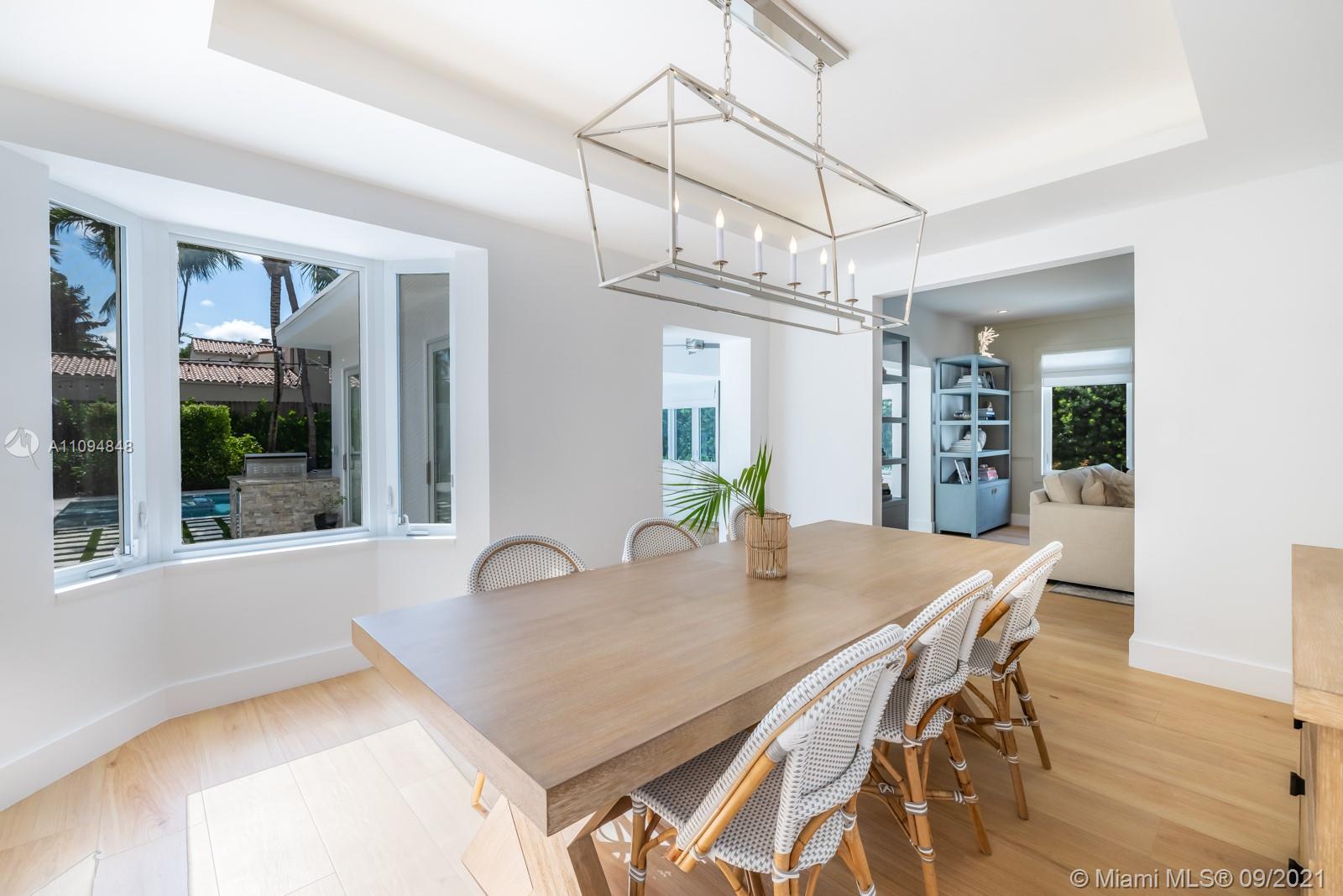 5235 North Bay Road Miami Beach, FL 33140 - Photo 9 of 22 a view of a dining room and livingroom