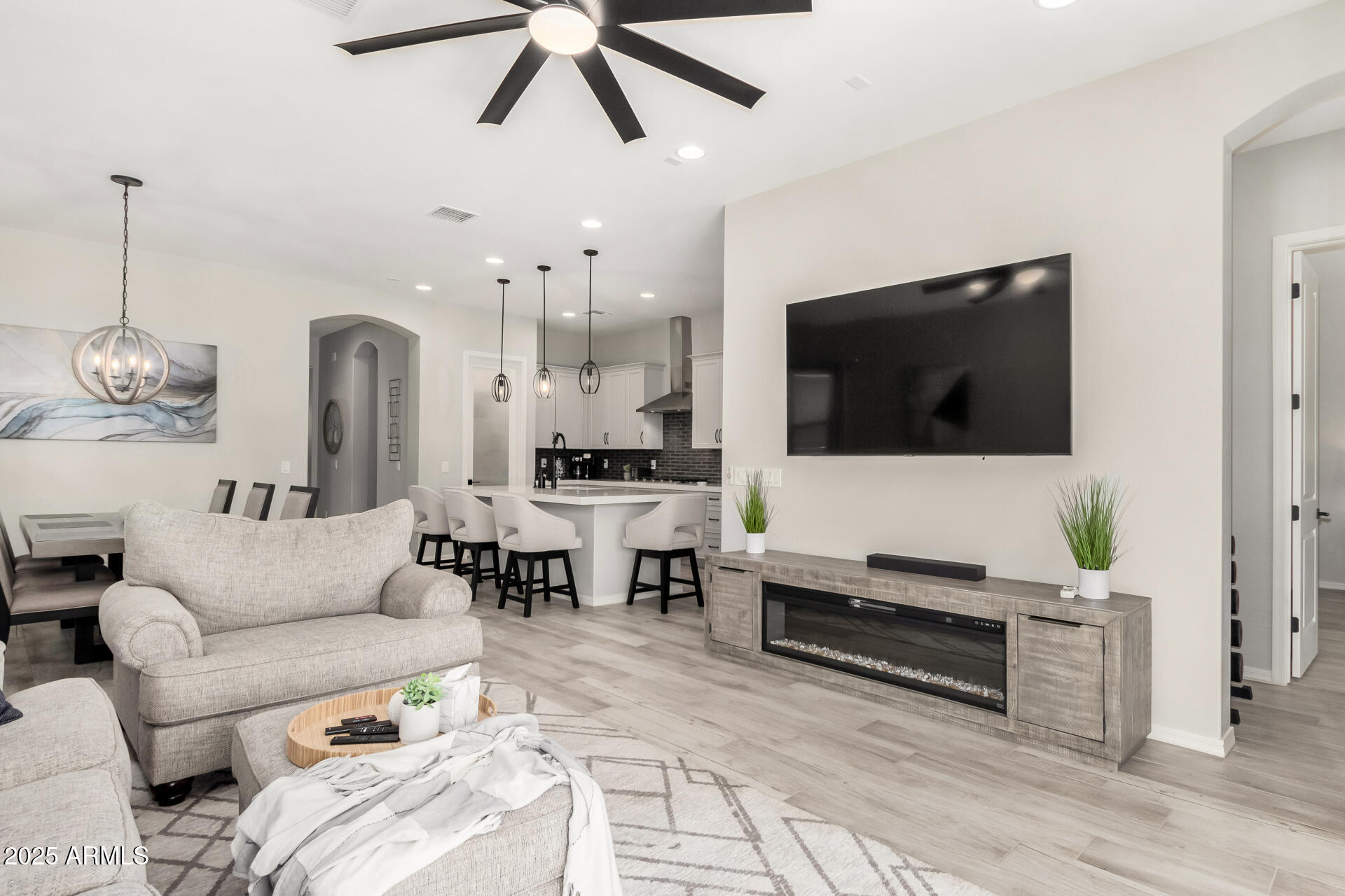 23129 East Carriage Way Queen Creek, AZ 85142 - Photo 11 of 50 a living room with furniture and a flat screen tv