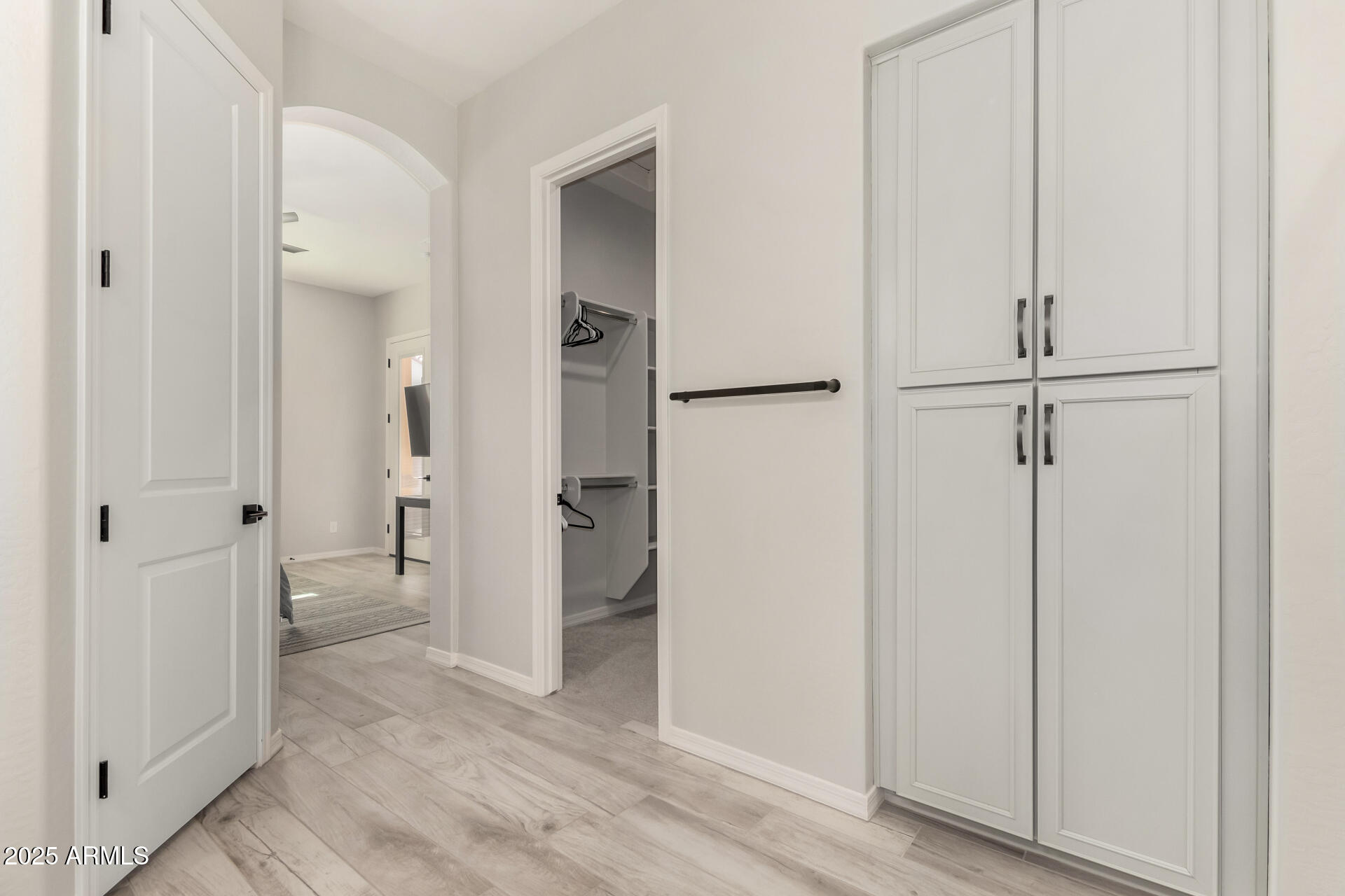23129 East Carriage Way Queen Creek, AZ 85142 - Photo 24 of 50 wooden floor with white cabinet