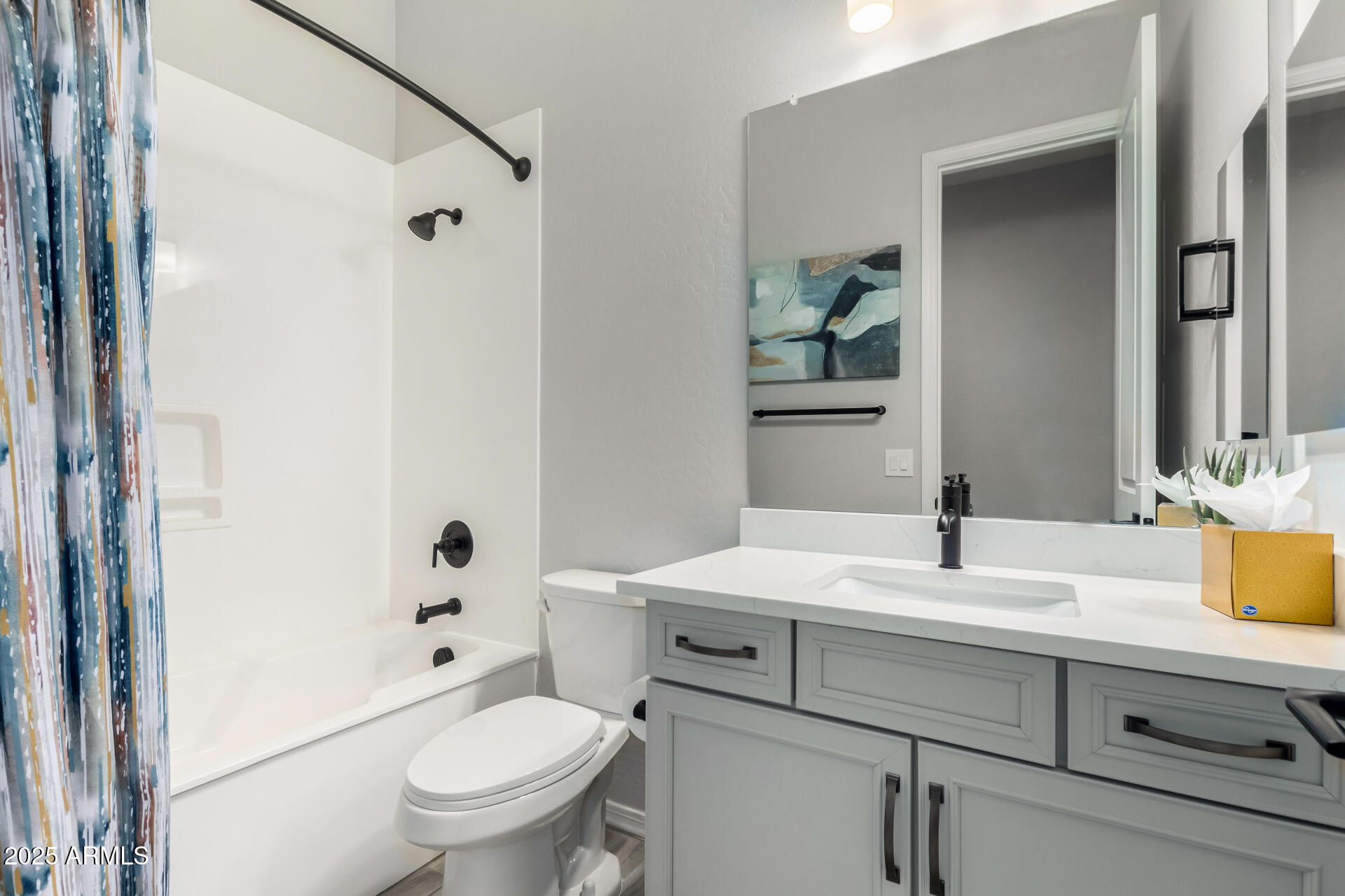 23129 East Carriage Way Queen Creek, AZ 85142 - Photo 31 of 50 a bathroom with a sink a toilet and shower