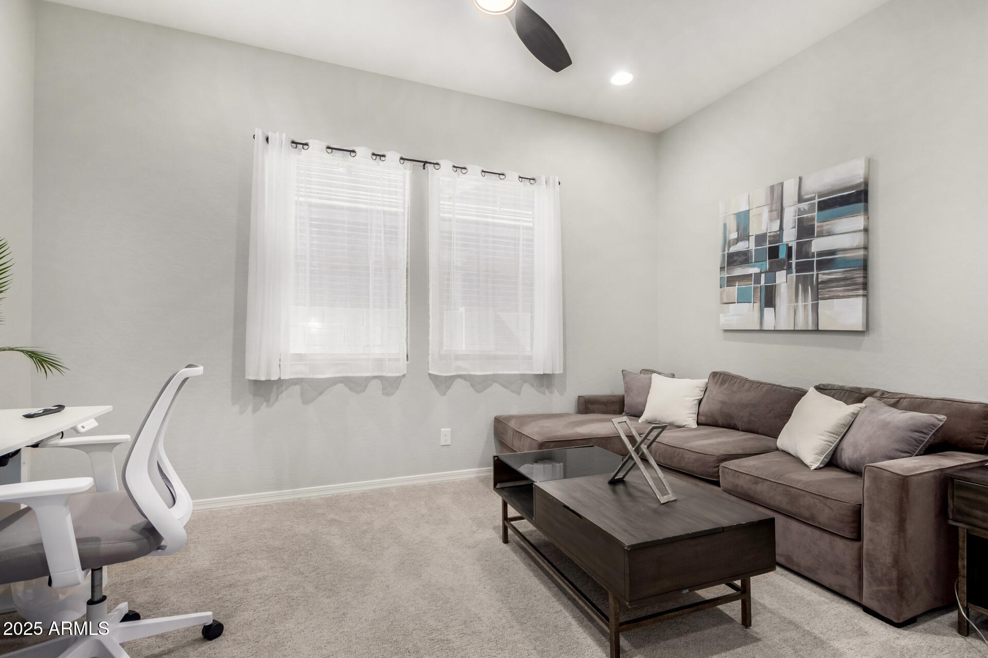 23129 East Carriage Way Queen Creek, AZ 85142 - Photo 35 of 50 a living room with furniture and a window