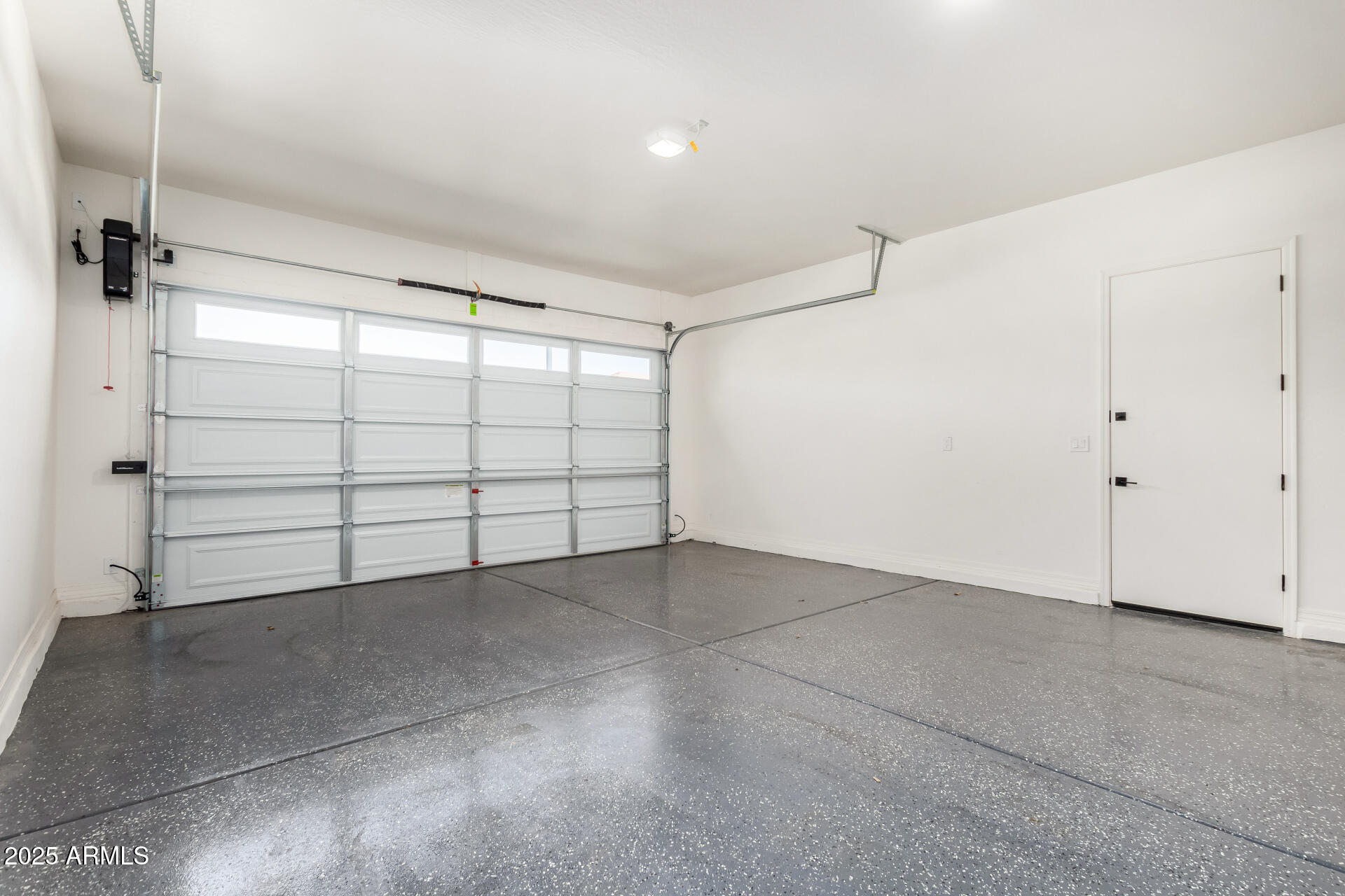 23129 East Carriage Way Queen Creek, AZ 85142 - Photo 39 of 50 a view of a garage