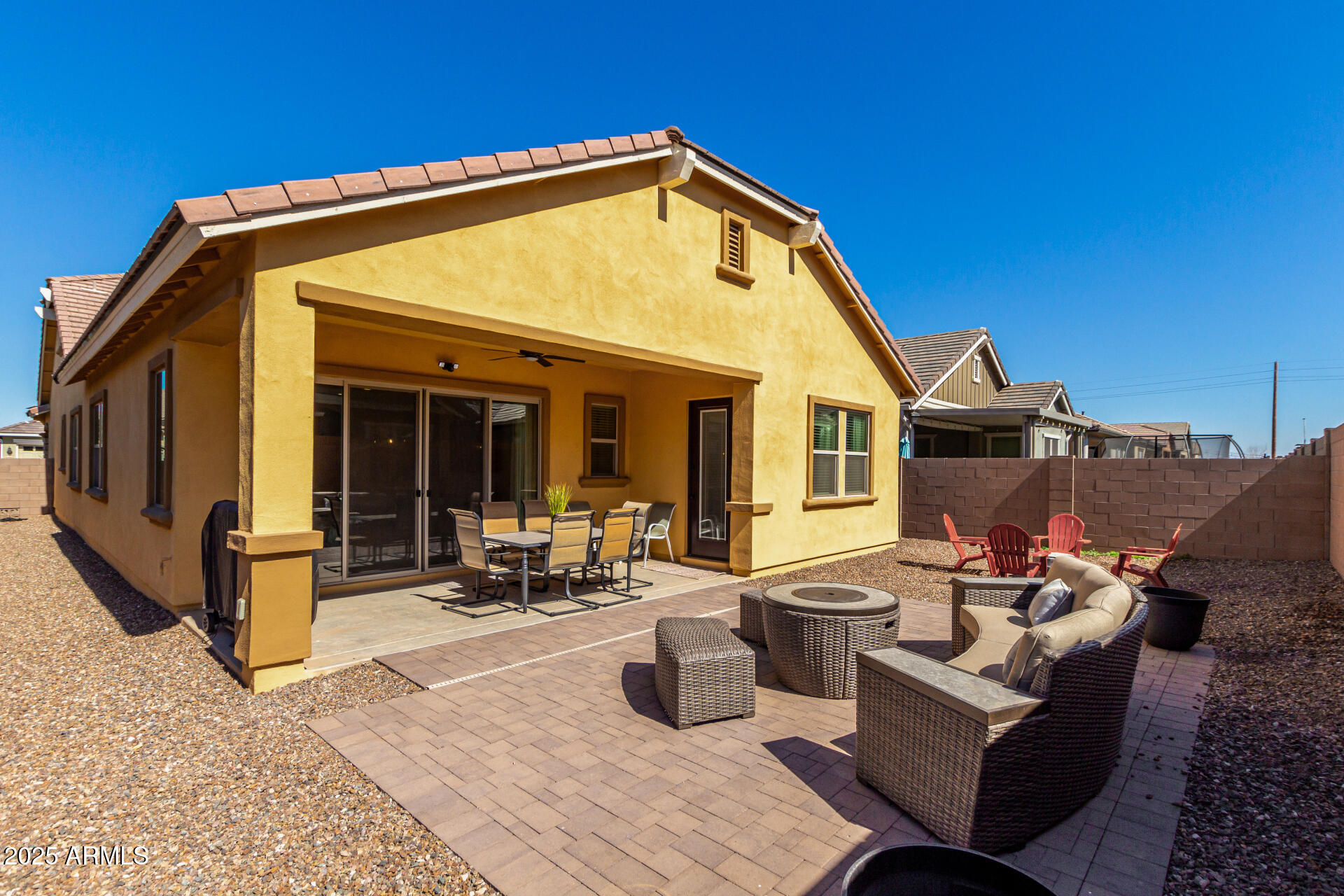 23129 East Carriage Way Queen Creek, AZ 85142 - Photo 43 of 50 a view of a dinning table and chairs in patio of the house