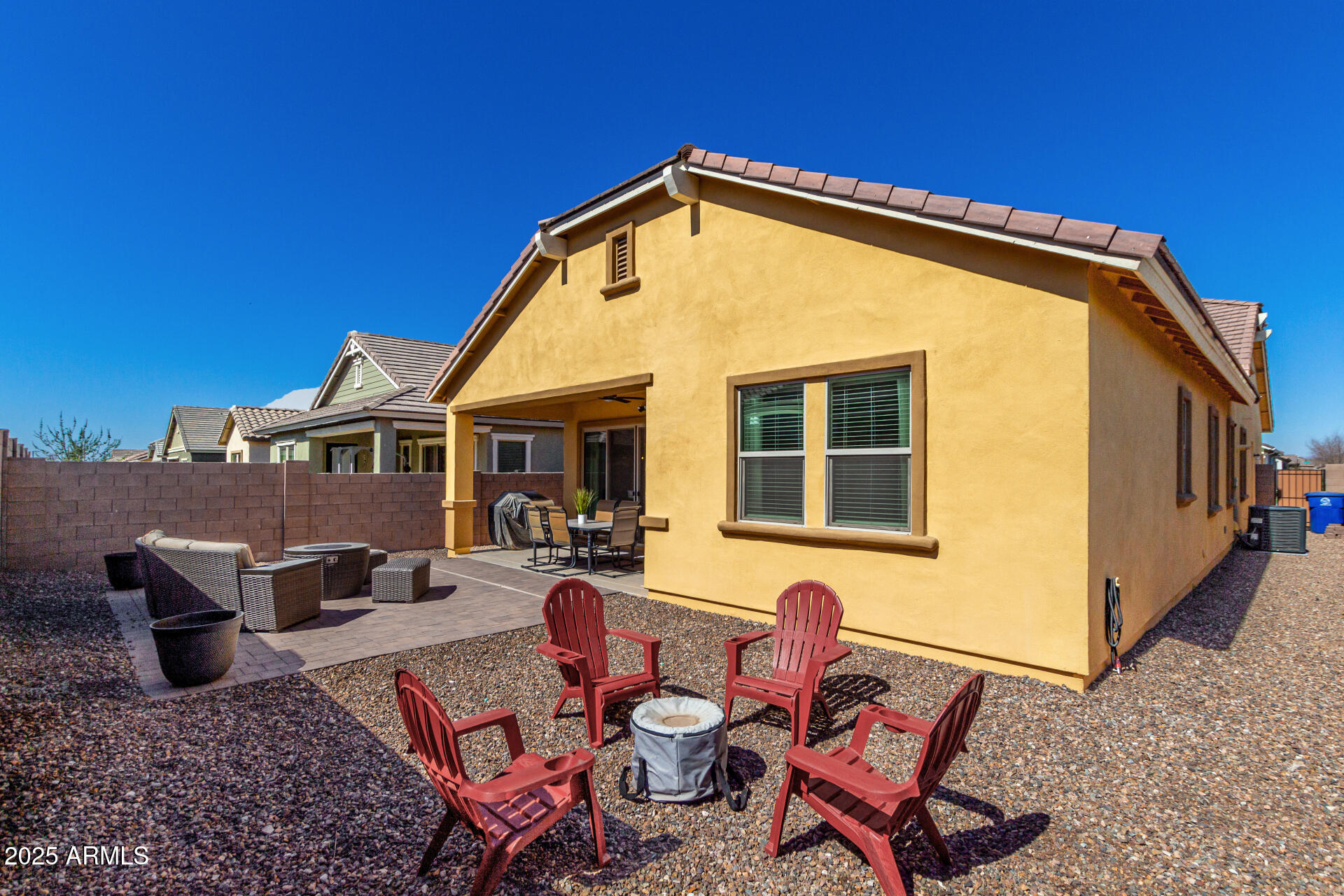 23129 East Carriage Way Queen Creek, AZ 85142 - Photo 44 of 50 a view of a house with backyard and sitting area