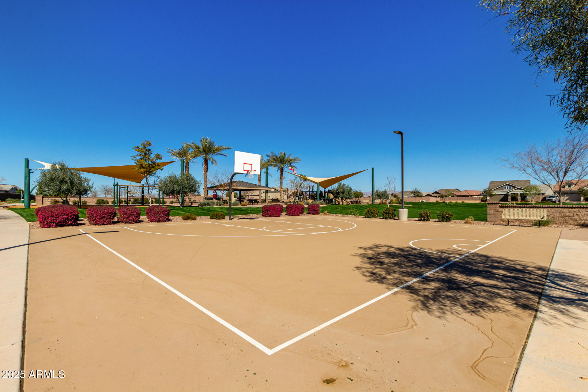 23129 East Carriage Way Queen Creek, AZ 85142 - Photo 49 of 50 a street view with tall buildings