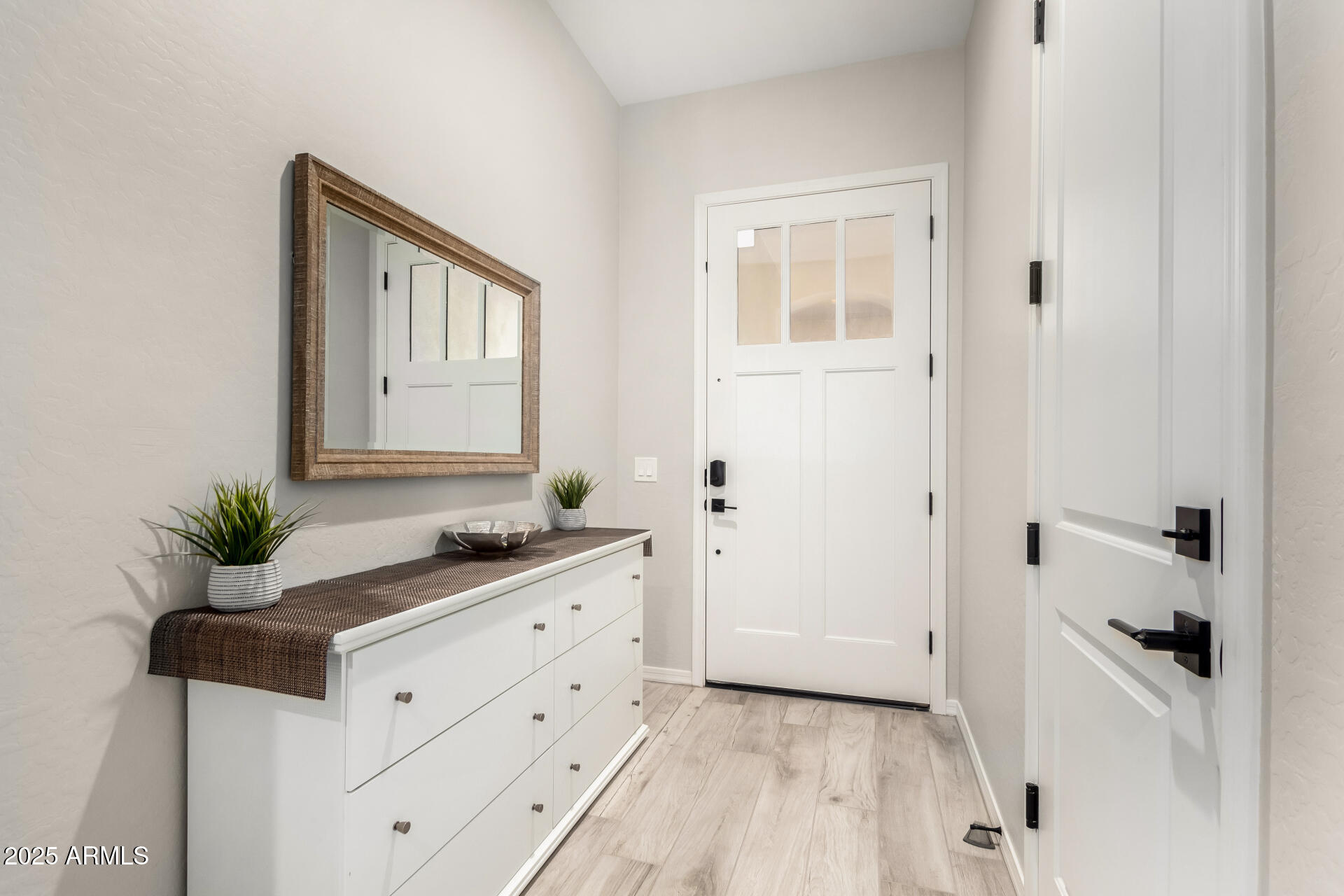 23129 East Carriage Way Queen Creek, AZ 85142 - Photo 5 of 50 a bathroom with a granite countertop sink a mirror and a bathtub