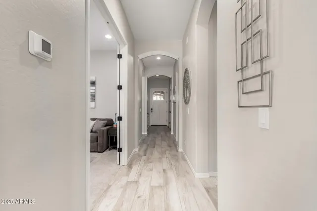 a view of a bathroom with a sink and a mirror