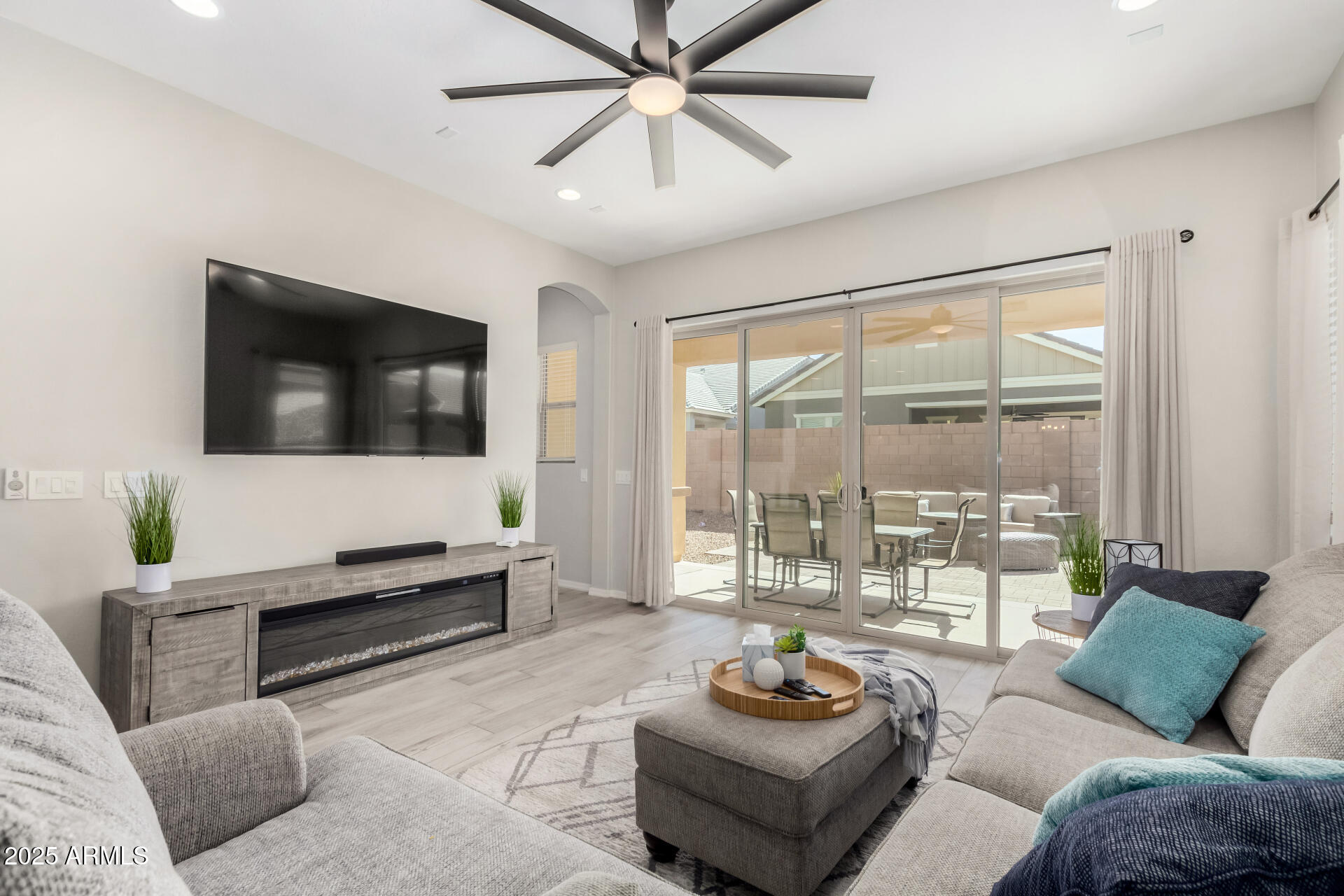 23129 East Carriage Way Queen Creek, AZ 85142 - Photo 9 of 50 a living room with furniture and a flat screen tv
