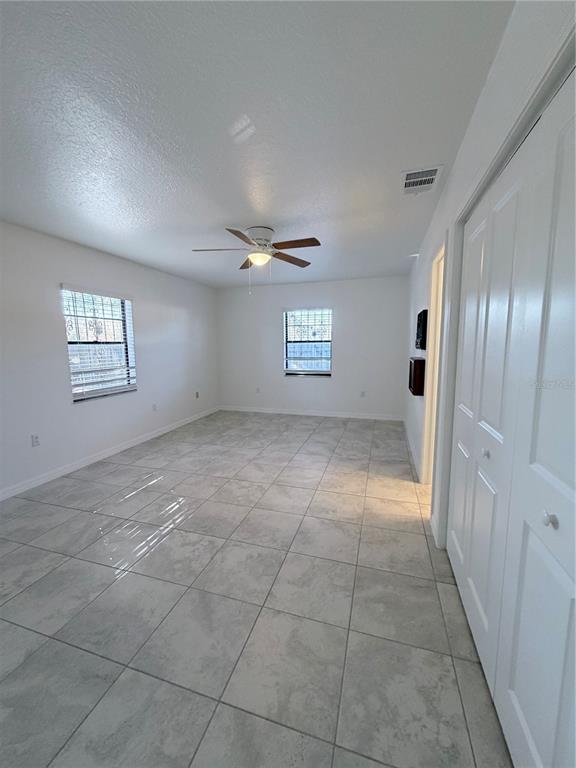2924 West Kathleen Street Tampa, FL 33607 - Photo 12 of 20 a view of an empty room and a window