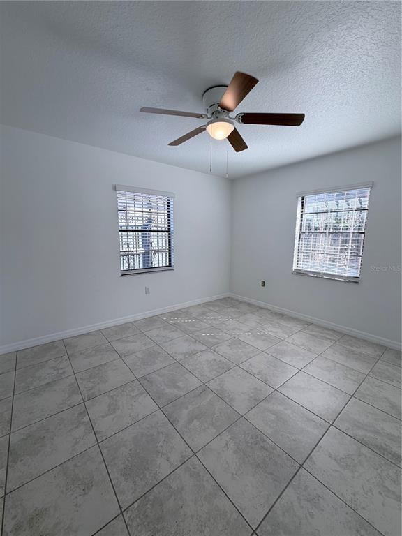 2924 West Kathleen Street Tampa, FL 33607 - Photo 16 of 20 a view of an empty room with a window