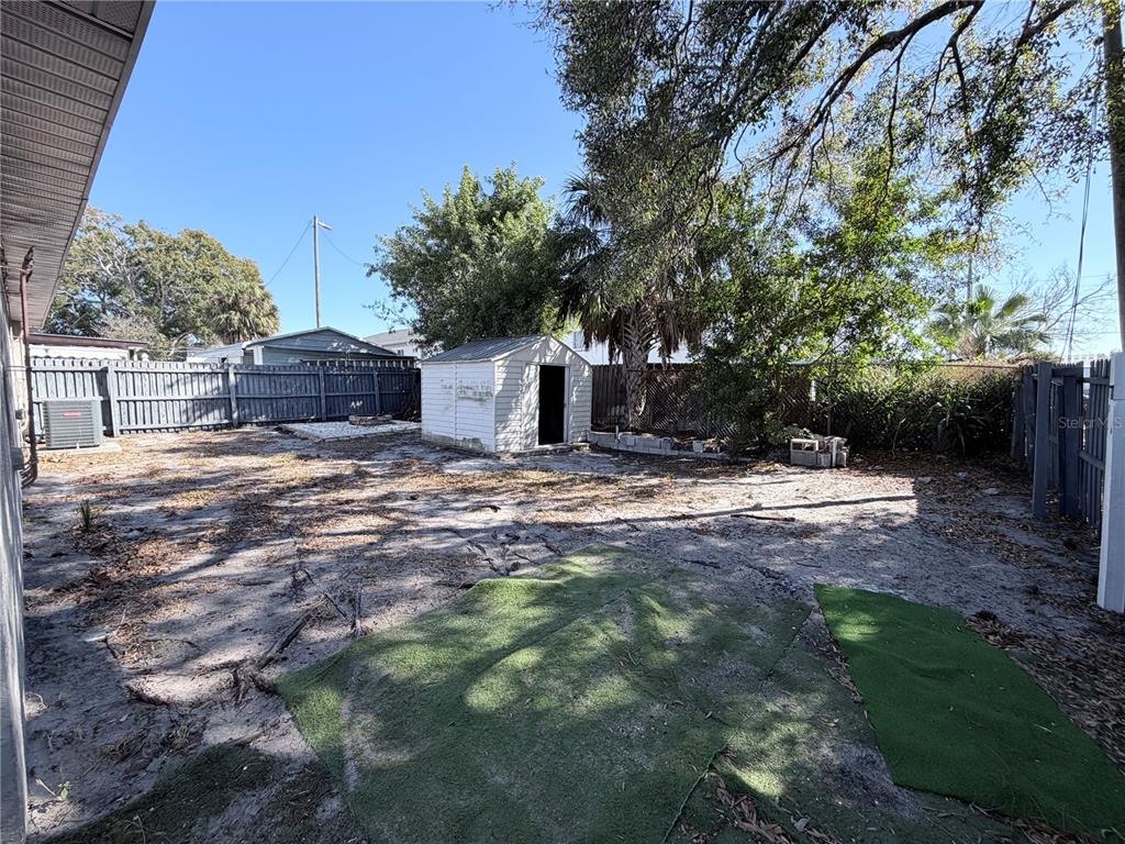 2924 West Kathleen Street Tampa, FL 33607 - Photo 20 of 20 a view of a house with yard and tree s