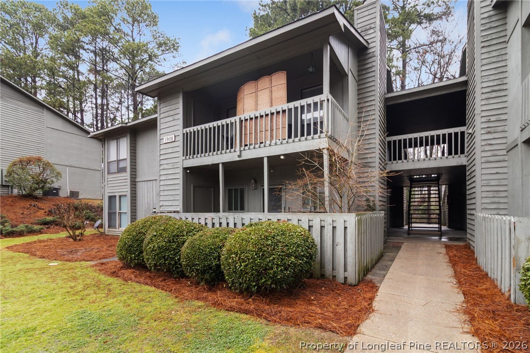 1908 Tryon Drive, Unit 1 Fayetteville, NC 28303 - Photo 2 of 29 a front view of a house with a yard
