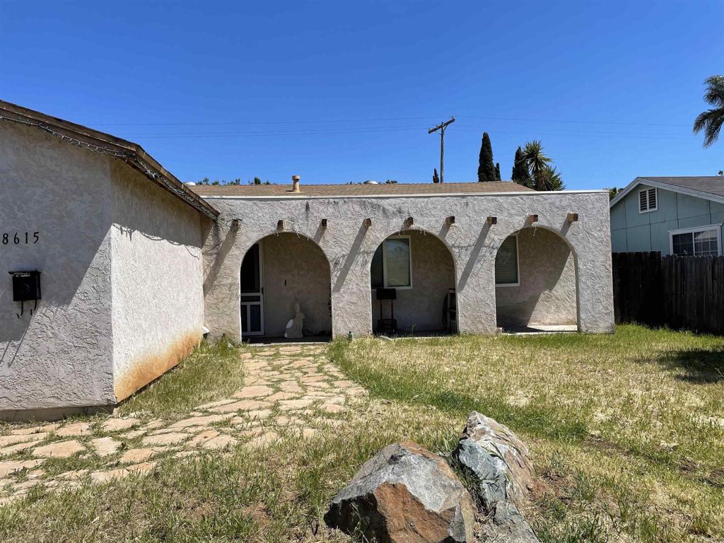 8615 Ian Way Santee, CA 92071 - Photo 1 of 1 a view of a house with a yard