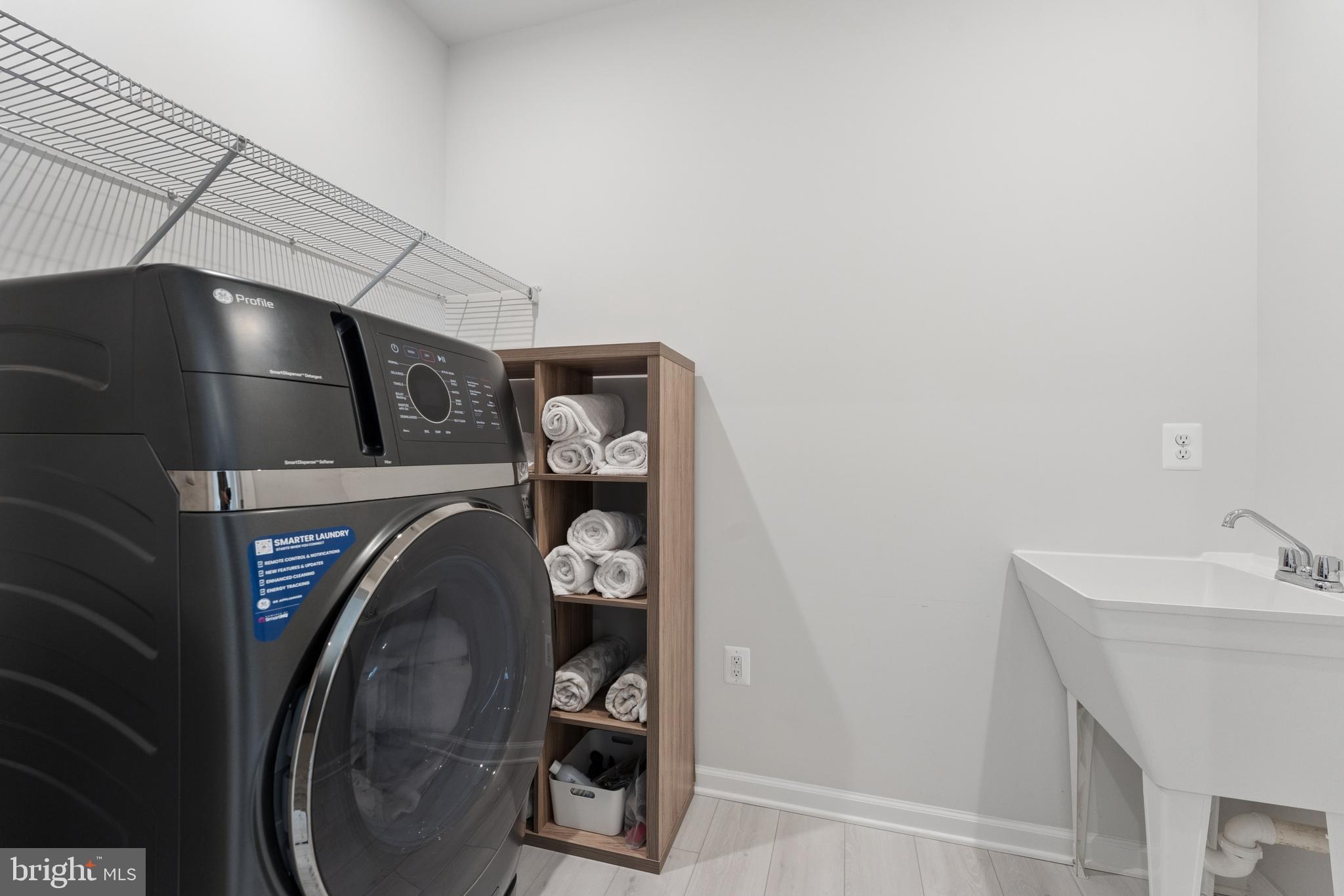 18320 Moss Garden Road Dumfries, VA 22026 - Photo 30 of 50 upper level laundry room (washer/dryer)