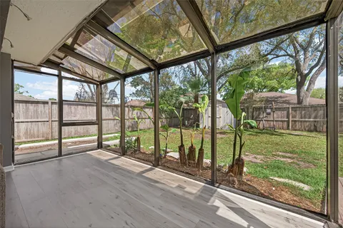 a view of backyard with green space