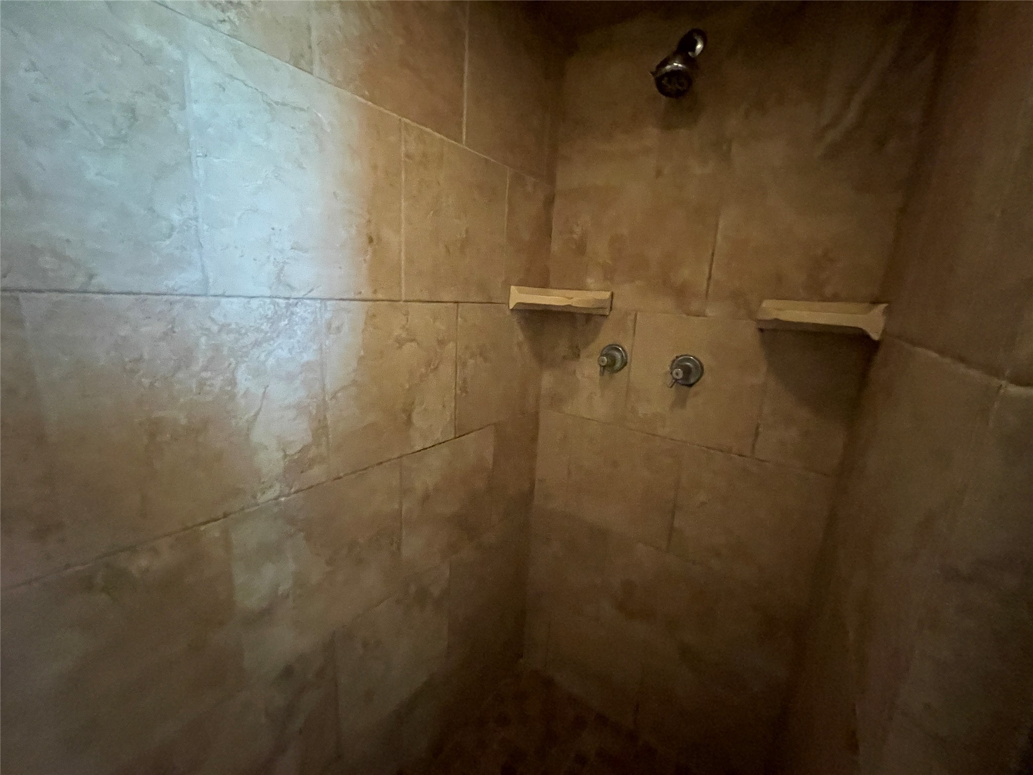 181 Greenleaf Lane Conroe, TX 77304 - Photo 13 of 15 a bathroom with a shower