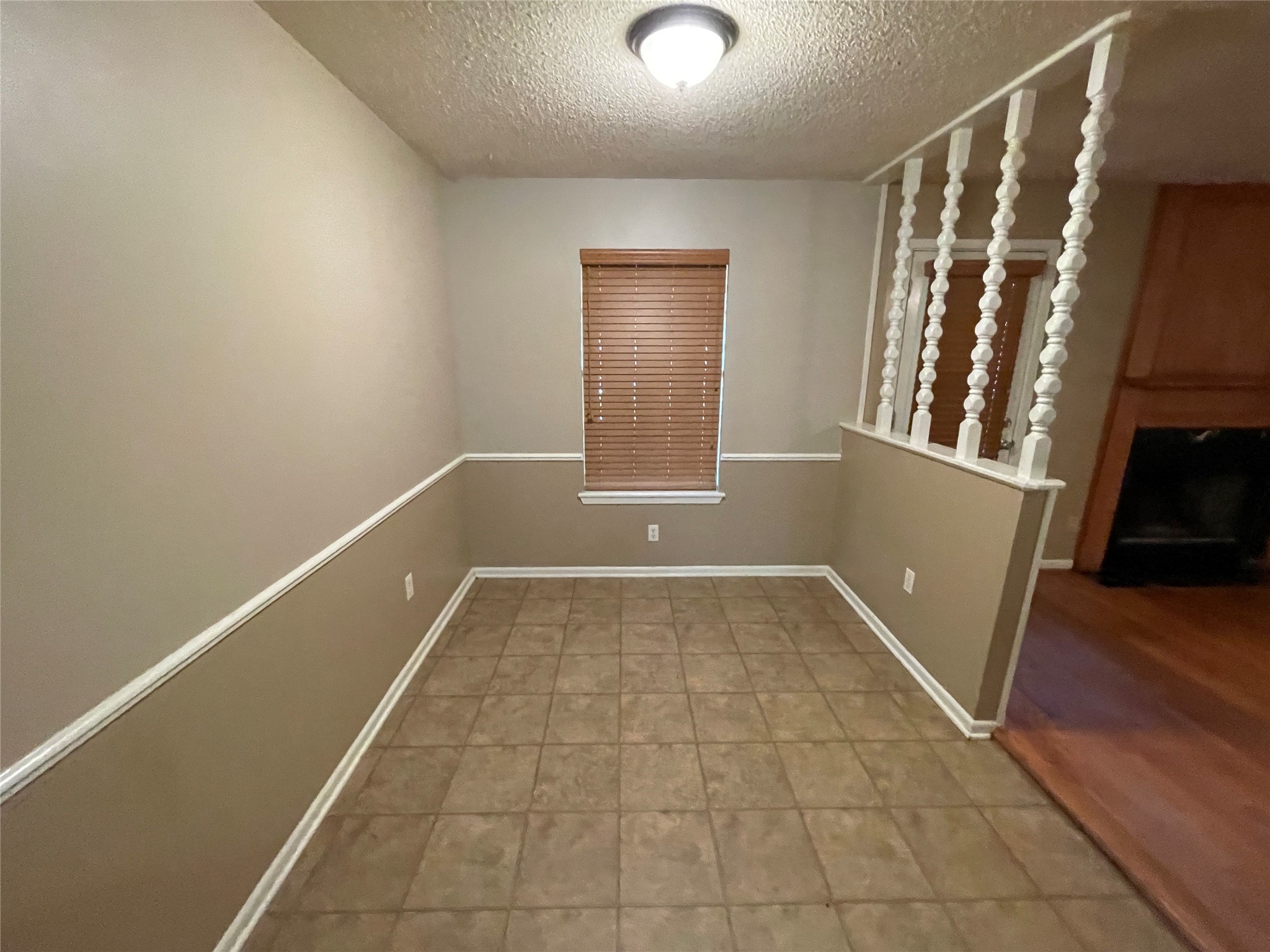 181 Greenleaf Lane Conroe, TX 77304 - Photo 6 of 15 an empty room with windows