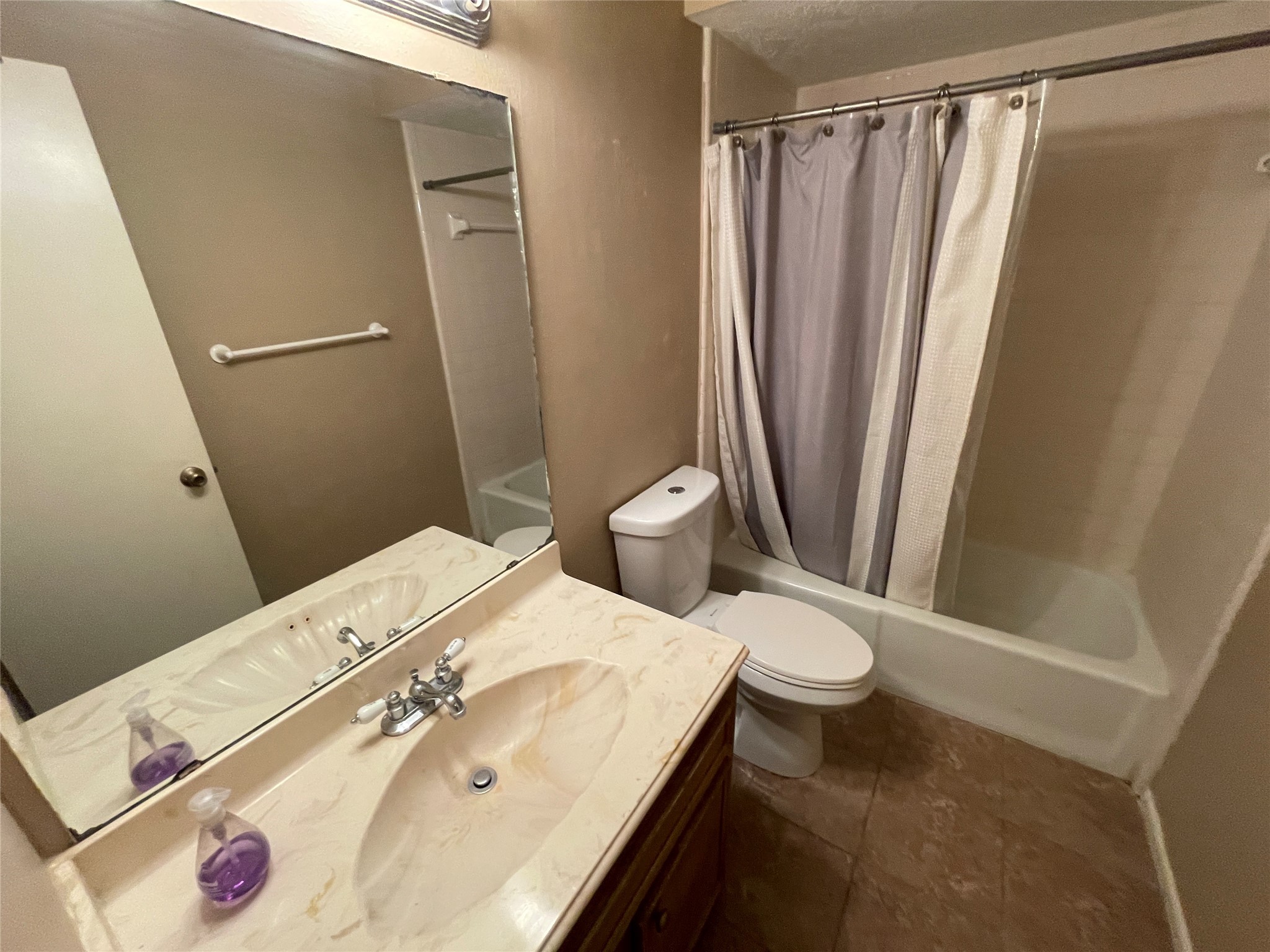 181 Greenleaf Lane Conroe, TX 77304 - Photo 8 of 15 a bathroom with a sink a toilet and a shower
