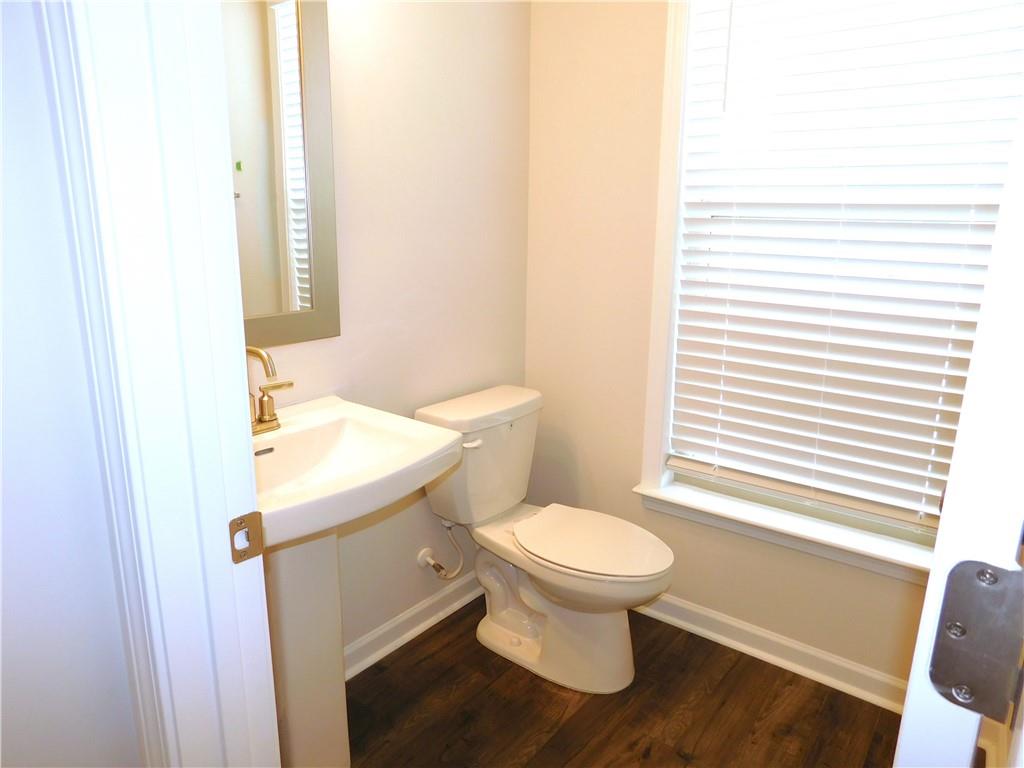 1626 Halbrook Place Southwest Marietta, GA 30008 - Photo 23 of 43 a bathroom with a sink and a toilet