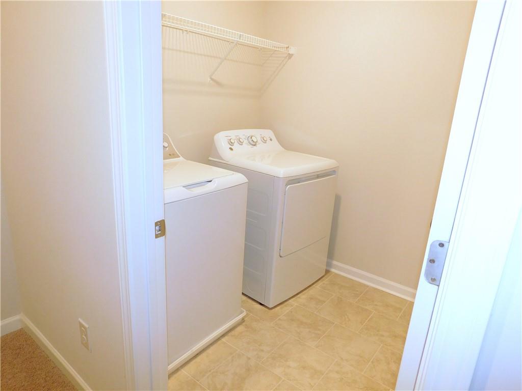 1626 Halbrook Place Southwest Marietta, GA 30008 - Photo 27 of 43 a utility room with dryer and washer