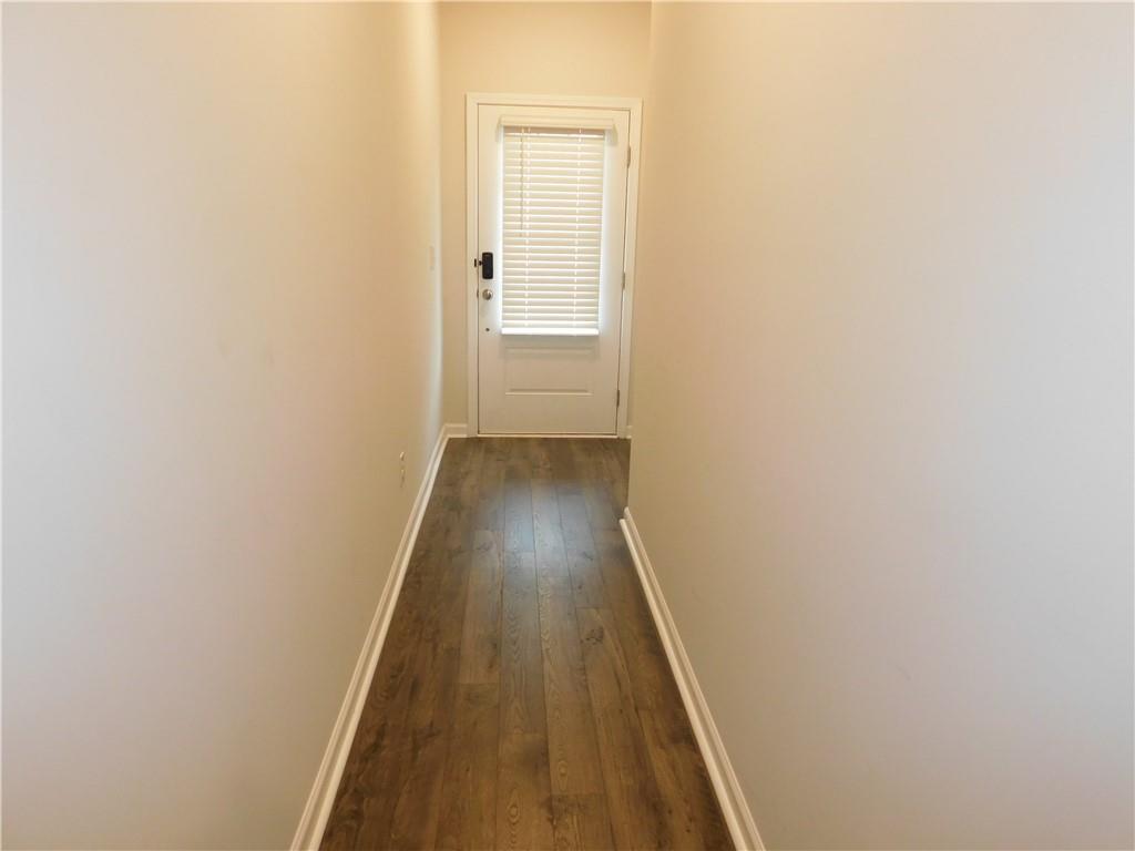 1626 Halbrook Place Southwest Marietta, GA 30008 - Photo 3 of 43 a view of a hallway with wooden floor
