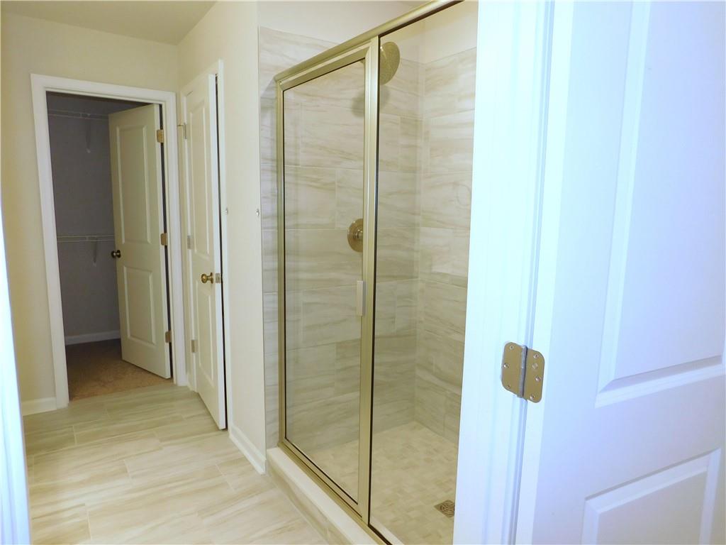 1626 Halbrook Place Southwest Marietta, GA 30008 - Photo 35 of 43 a bathroom with a shower