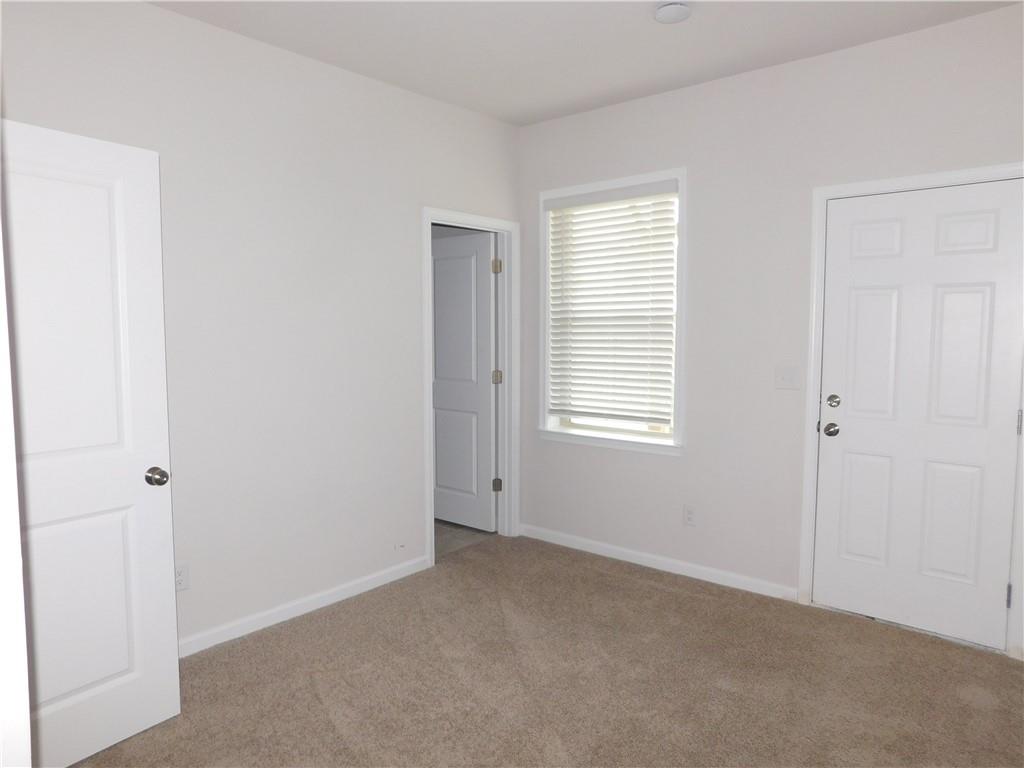 1626 Halbrook Place Southwest Marietta, GA 30008 - Photo 5 of 43 a view of an empty room with a window