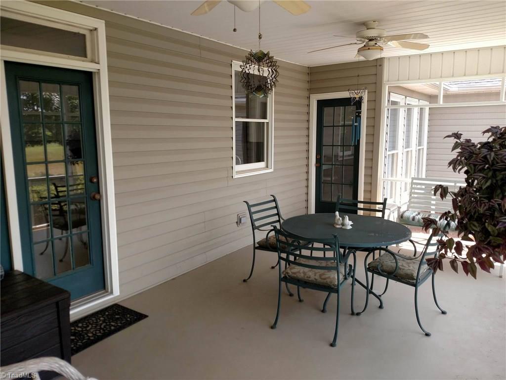 785 Carson Road Pilot Mountain, NC 27041 - Photo 12 of 30 Screened porch off kitchen.