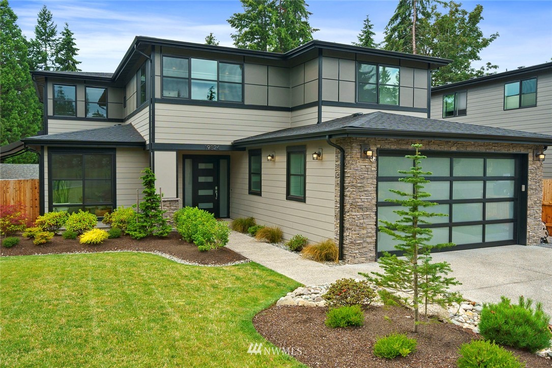 19824 86th Place West Edmonds, WA 98026 - Photo 1 of 40 a front view of a house with garden