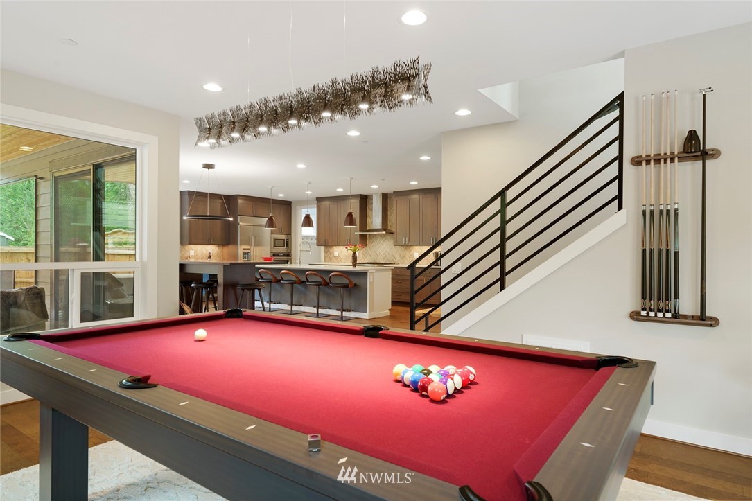 19824 86th Place West Edmonds, WA 98026 - Photo 11 of 40 a room with pool table and windows