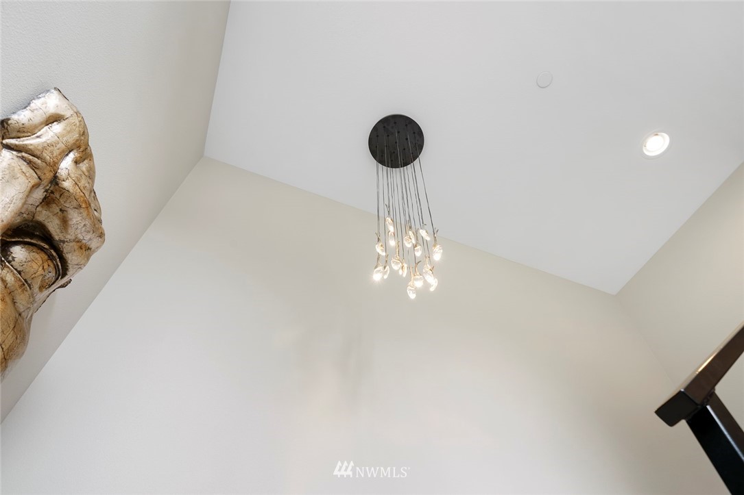 19824 86th Place West Edmonds, WA 98026 - Photo 13 of 40 a view of a chandelier fan and a rug