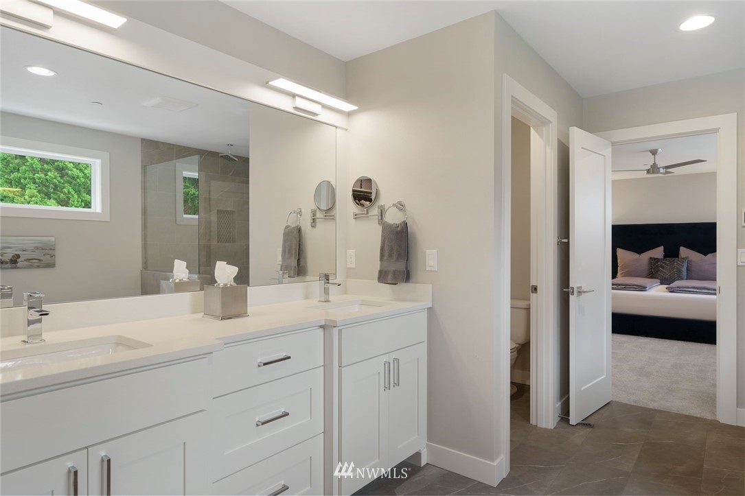 19824 86th Place West Edmonds, WA 98026 - Photo 20 of 40 a en suite bathroom with a double vanity sink and mirror