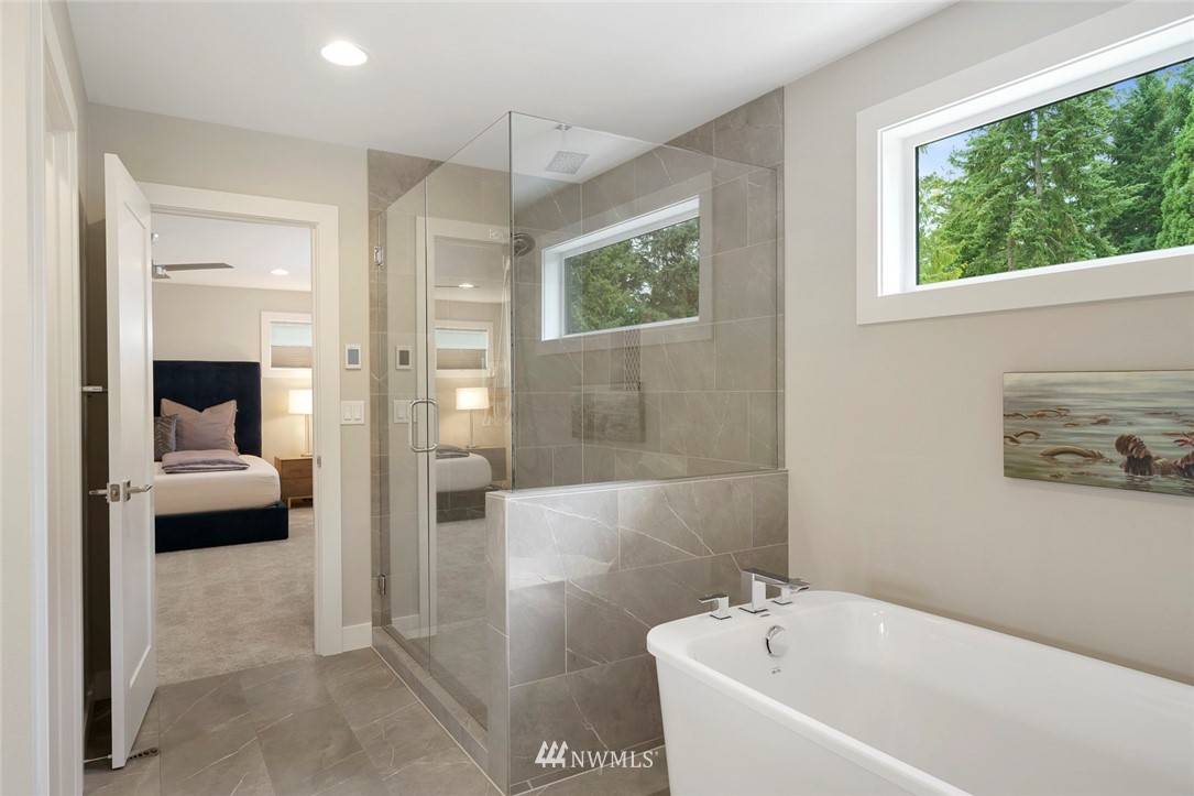 19824 86th Place West Edmonds, WA 98026 - Photo 21 of 40 a en suite bathroom with a tub and shower