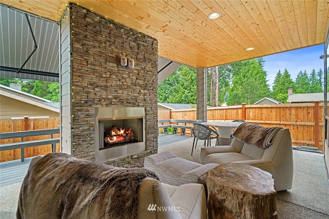 19824 86th Place West Edmonds, WA 98026 - Photo 34 of 40 a outdoor living space with furniture and a fireplace
